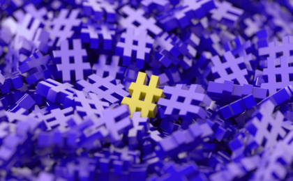 Image of a bunch of hashtags in purple with one in yellow